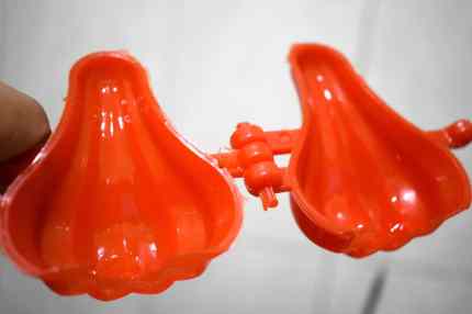 Grease the inside of the modak mould with ghee