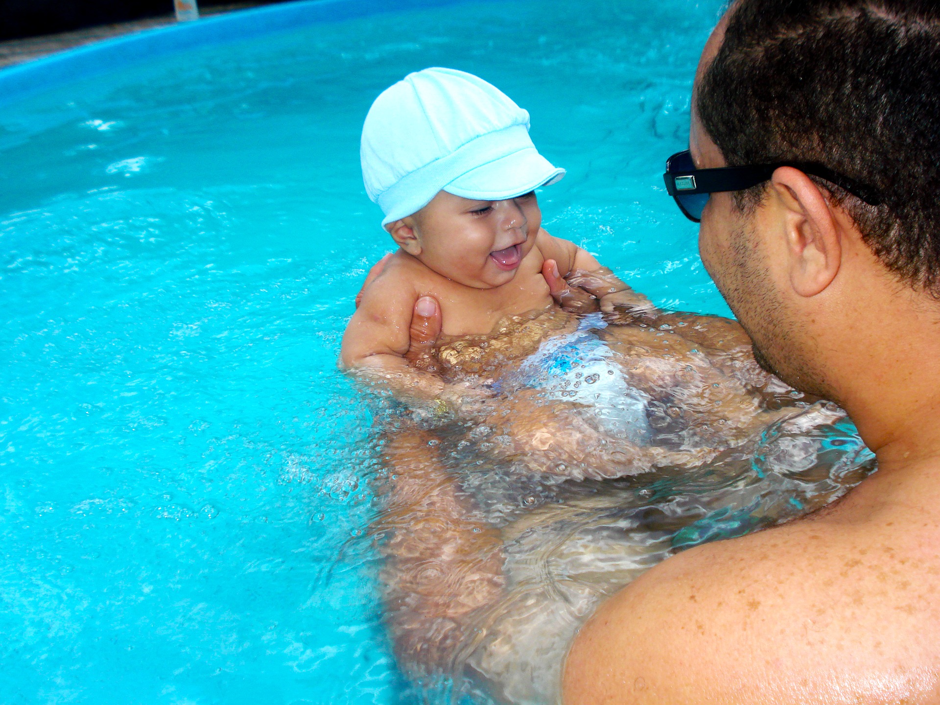 New dad helps in baby bathing