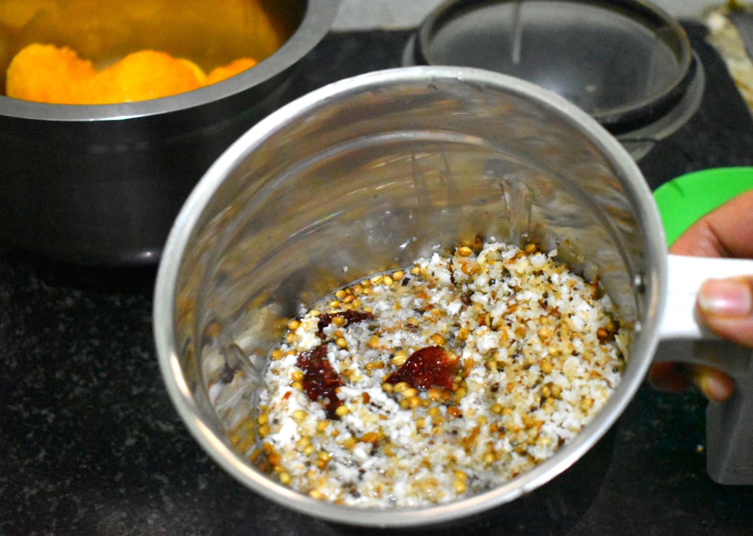 Add all the roasted contents to a mixer jar & blend to a paste