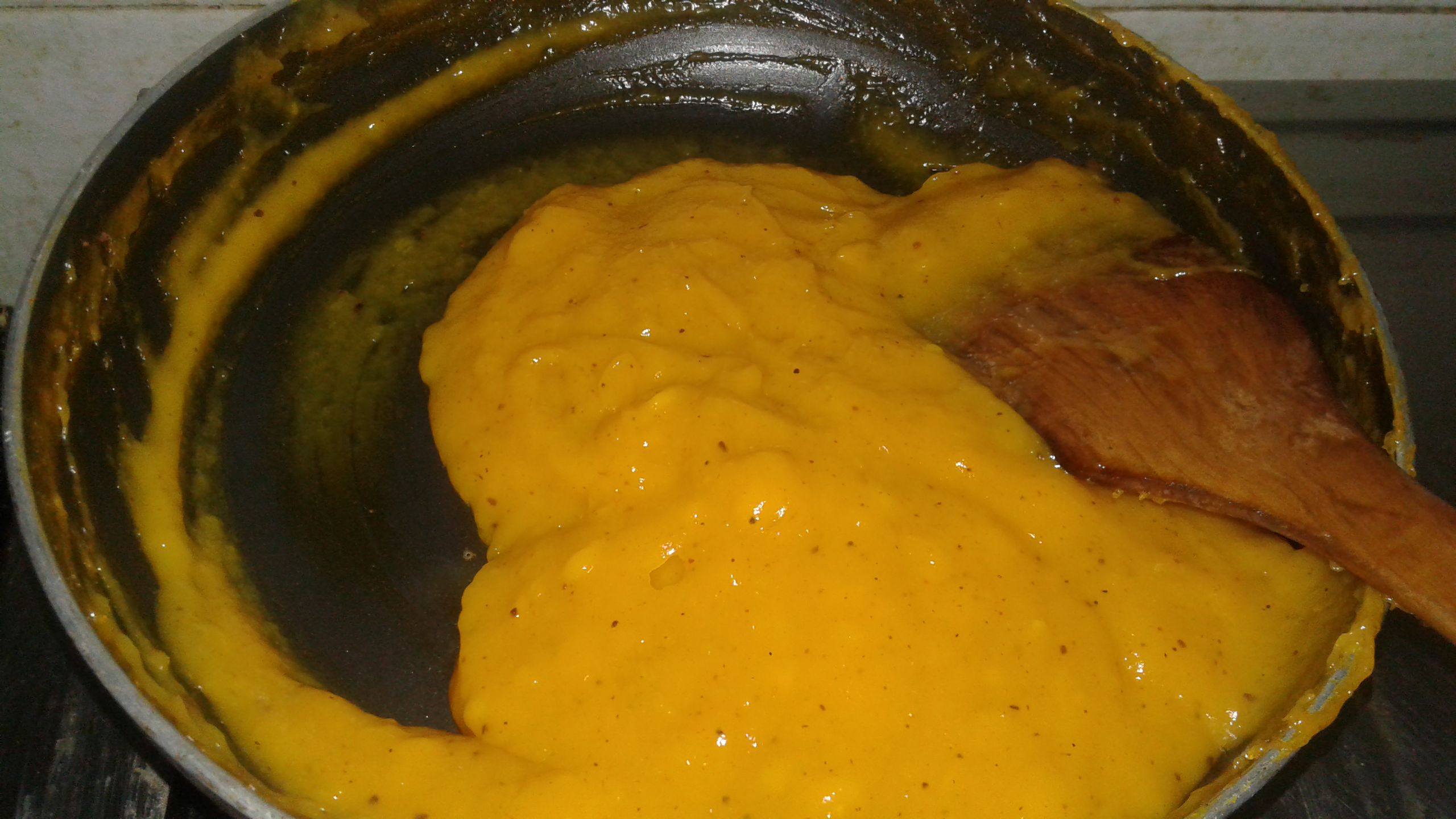 Mango jam starts thickening before you turn the flame off