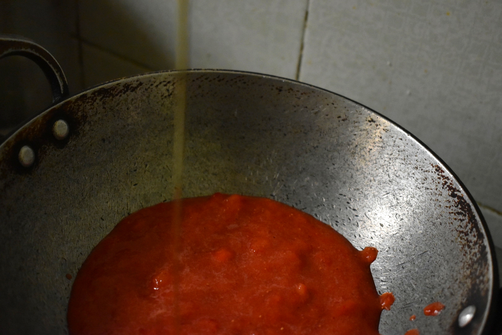 Add the strawberry puree to a saucepan & then the liquid jaggery