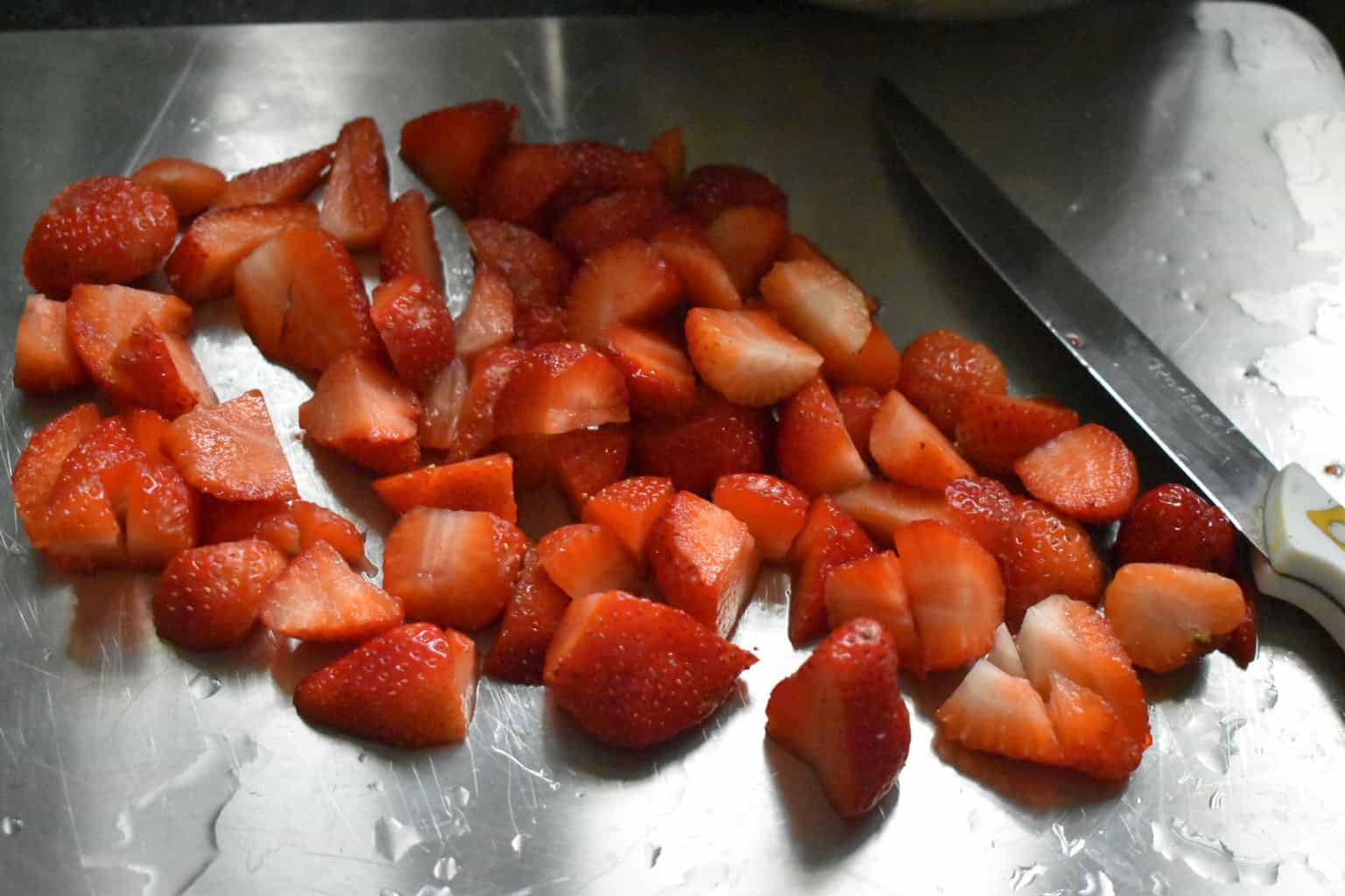 Wash & cut all the strawberries into halves